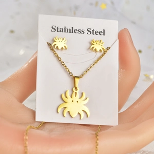 Golden stainless steel spider pendant necklace and matching stud earrings jewelry set