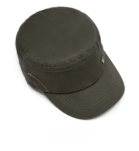Detail of dark army green flat top military cap with premium cotton twill and metal badge