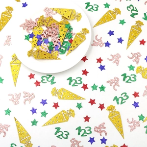 Glitter back-to-school confetti with school cones, stars and numbers for party decor