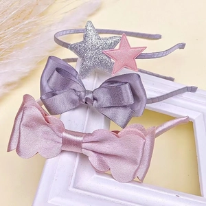 Three-piece set of girls' bow and star headbands in pink and purple satin and sequins