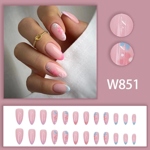 Pink almond press-on nails with French gradient, floral design, and glossy finish W851