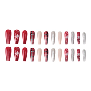 Christmas press-on nails with red plaid, silver glitter and white snowflake patterns