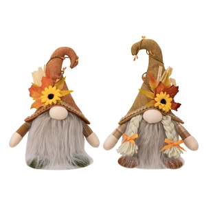Set of two Thanksgiving gnomes with maple leaf and sunflower hats on white background