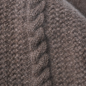 Thick cable-knit wool slouchy beanie in dark chocolate brown for autumn and winter warmth