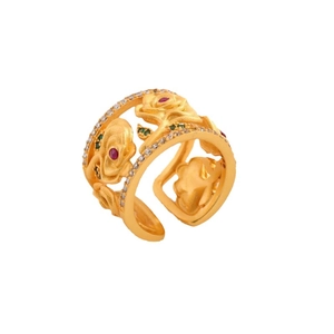 Vintage gold hollow flower ring with red and green gemstones on white background