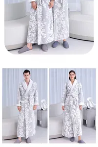 Detail of grey floral jacquard fleece robe with plush collar and warm textured fabric