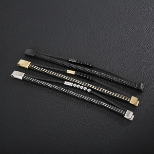 Three men's punk leather braided bracelets with magnetic metal clasps in black and gold