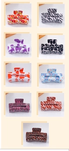 Collection of colorful PVC hair claws with floral, leopard and cow patterns for styling