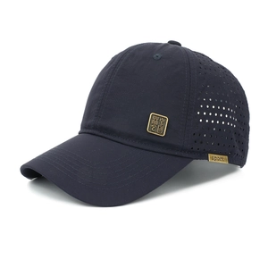 Dark blue quick-dry baseball cap with laser-cut breathability and Chinese metal badge