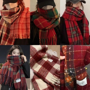 Detailed close-up of thick plaid scarves showing soft wool texture and colorful patterns