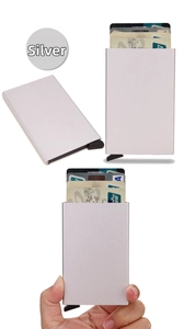 Silver RFID blocking aluminum card holder with automatic pop-up mechanism detail