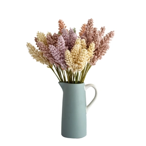 Pastel artificial grain wheat stalks in various colors for home and wedding decoration