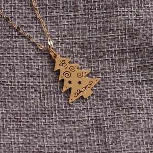 Collier en acier inoxydable doré avec pendentif sapin de Noël et motifs d'étoiles