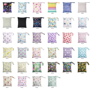 Waterproof portable baby wet bag with various colorful prints and convenient hanging strap