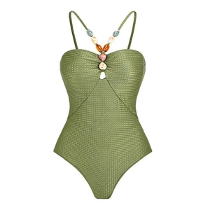Close-up of olive green textured swimsuit fabric with colorful decorative beads
