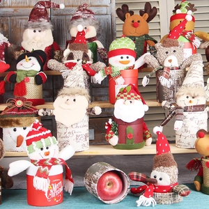 Christmas gift box jars with plush Santa Snowman and Reindeer characters for apple storage