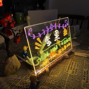 Macro detail of rewritable LED acrylic message board with vibrant neon light effects