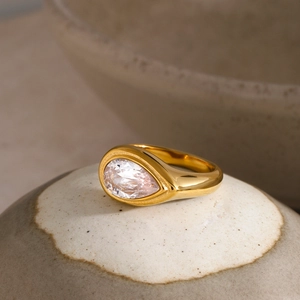 Luxury 18k gold plated stainless steel ring with pear-cut white zircon and wide band