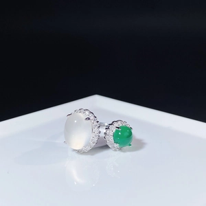 Macro view of S925 silver ring featuring white oval chalcedony and green agate stones