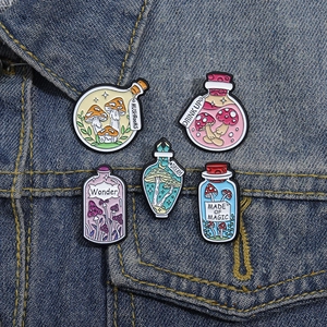 5-piece mushroom magic potion enamel pin set on denim jacket with dream themes