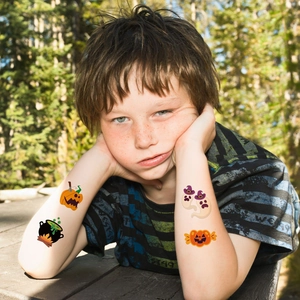 Cute Halloween cartoon pumpkin and ghost waterproof temporary tattoos for kids outdoors