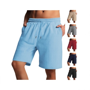 Men's summer textured drawstring shorts with waffle knit pattern in multiple colors