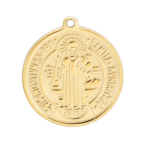 Detailed close-up of golden titanium steel medal pendant with embossed figure and Latin text