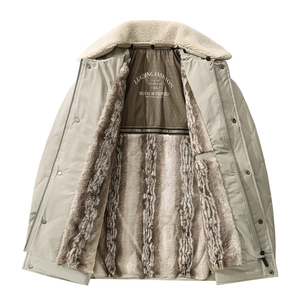 Detailed view of winter jacket with faux fur lining and plush collar for men