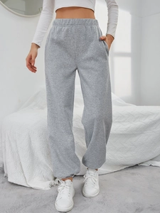 Pantaloni sportivi grigi a vita alta da donna con elastico in vita e polsini alle caviglie