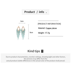 Detailed size specifications for geometric tassel earrings with copper and zircon details