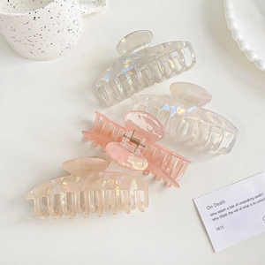 Iridescent mermaid hair claws in multiple colors with elegant pearl-like finish