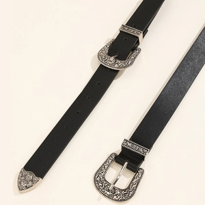 Western style black leather belt with ornate silver floral engraved buckle and tip