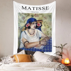 Detailed macro view of Henri Matisse style tapestry hanging on a modern bedroom wall