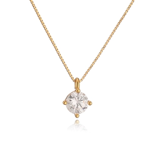 Detail of a gold box chain necklace featuring a 4-claw set sparkling round cubic zirconia