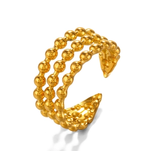 Bague manchette triple rangée de billes dorées en acier inoxydable au design ouvert