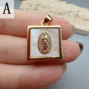 Macro shot of square gold Virgin Mary pendant with mother-of-pearl and zircon inlay