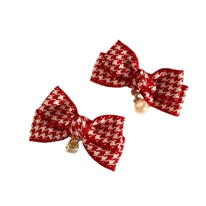 Pair of red houndstooth bow hair clips with faux pearl charms for women
