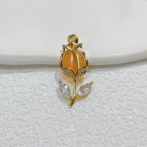 Gold tulip pendant featuring orange cat eye stone and clear zircon accents for women