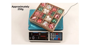 Detailed view of the 250g Christmas ornament set in red, green, and white patterns