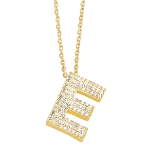 Close-up of gold letter E necklace pendant with sparkling paved cubic zirconia stones