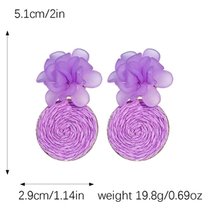 Detailed view of purple raffia flower earrings showing 5.1cm height and 19.8g weight