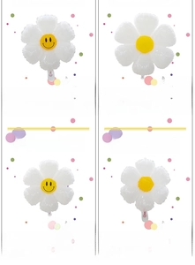 Detail view of white daisy foil balloons in various sizes with smile faces for party
