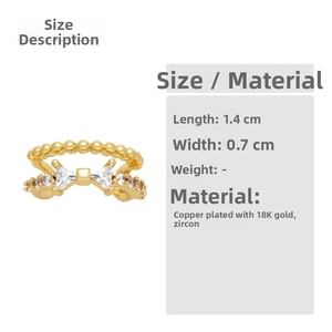 Detailed view of 18K gold plated bow ear cuff with zircon settings and size specifications