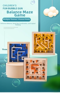Detail of wooden balance maze puzzle with numbered paths and metal balls for kids