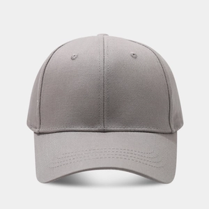 Detailed close-up of dark grey baseball cap with twill fabric and reinforced stitching