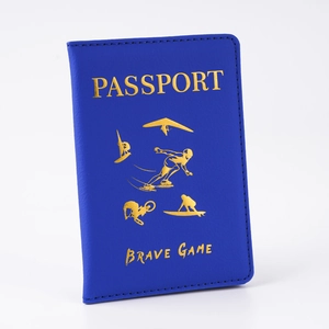 Close-up of navy blue PU leather passport cover with gold-stamped extreme sports design