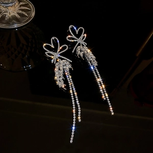 Elegant silver tassel earrings with heart bow design and sparkling rhinestones for women