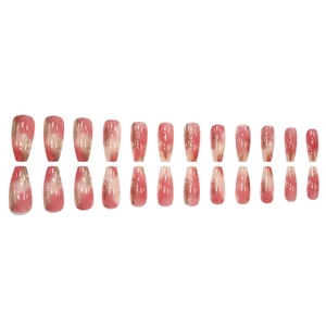 Pink gradient press-on nails in long ballet shape with gold foil accents and nude finish