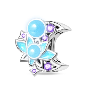Detailed silver crescent moon charm featuring lotus design and glowing blue glass beads