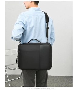 Rear view of a model carrying the black multifunctional business laptop backpack